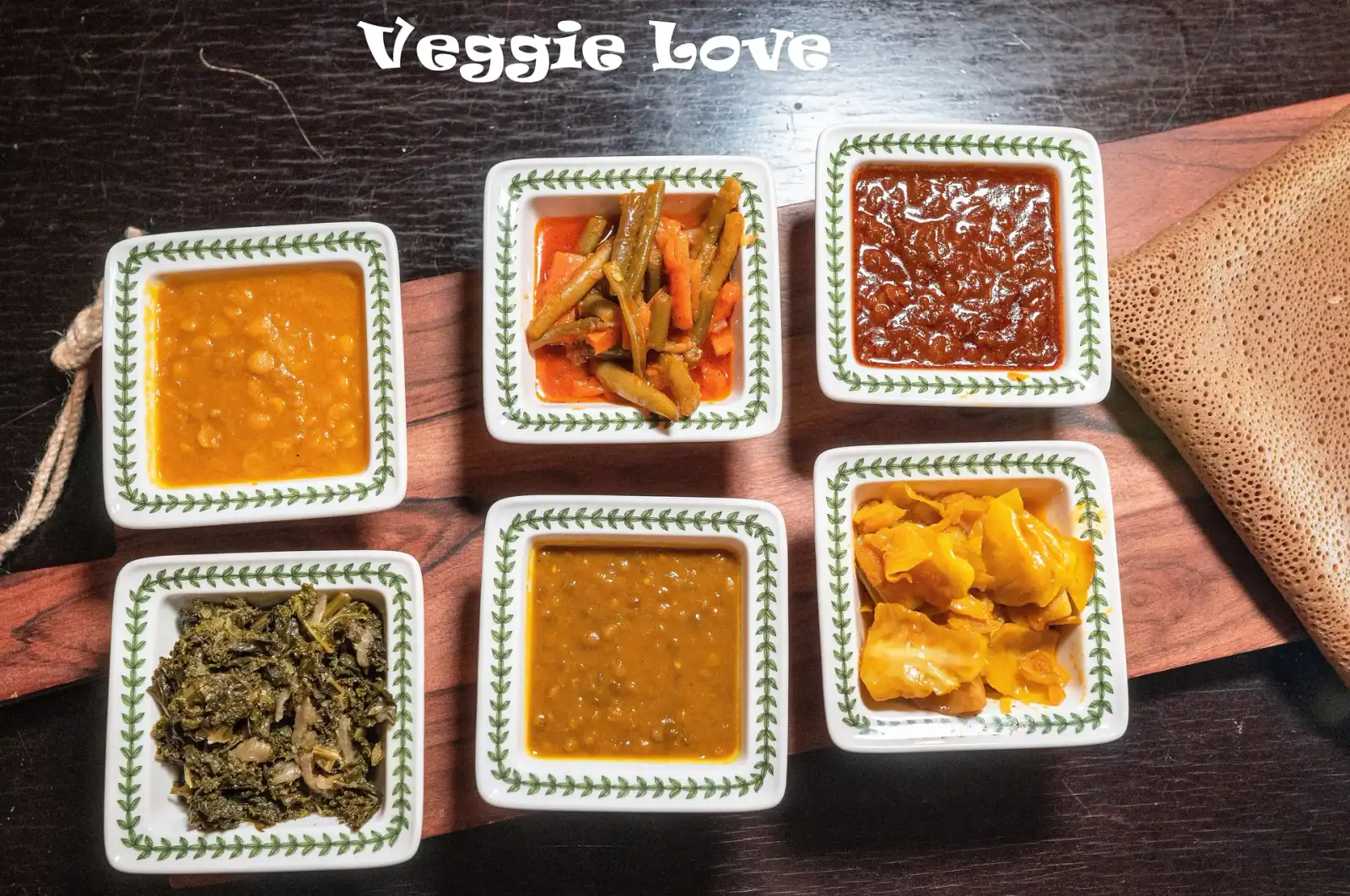 Colorful vegetable sampler platter at Mesob